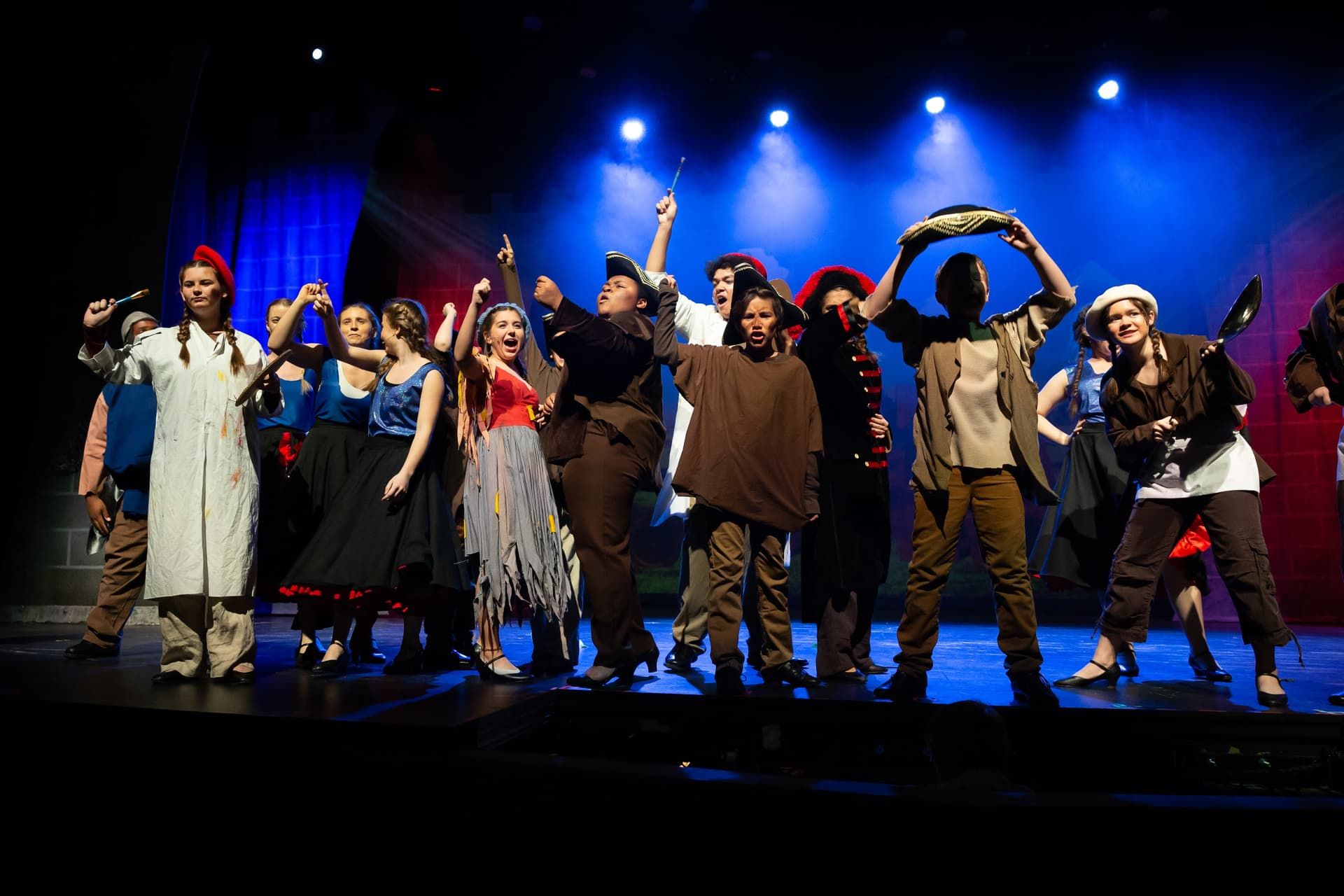 The cast performing a big ensemble number in Spamalot