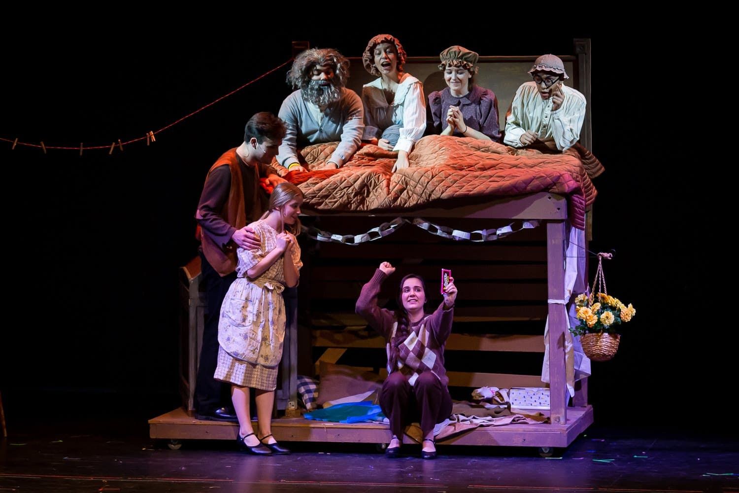 Colorful ensemble bed scene from Willy Wonka